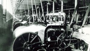 Black and white image of Columbia Mills interior showing loom machinery