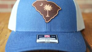 Baseball Cap with Denim Blue Front and Brown Leather SC Shaped Patch with Palmetto and Crescent